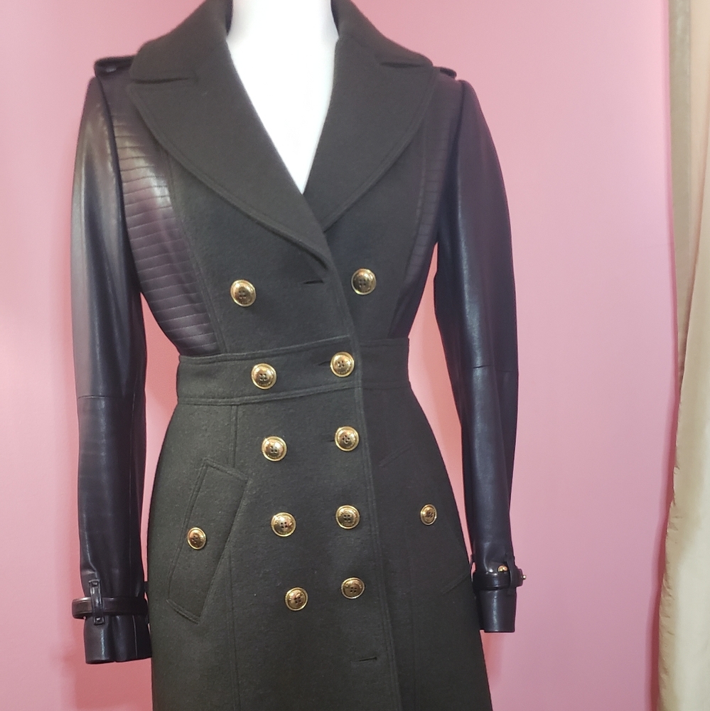 Burberry London army green virgin wool coat with black leather details.